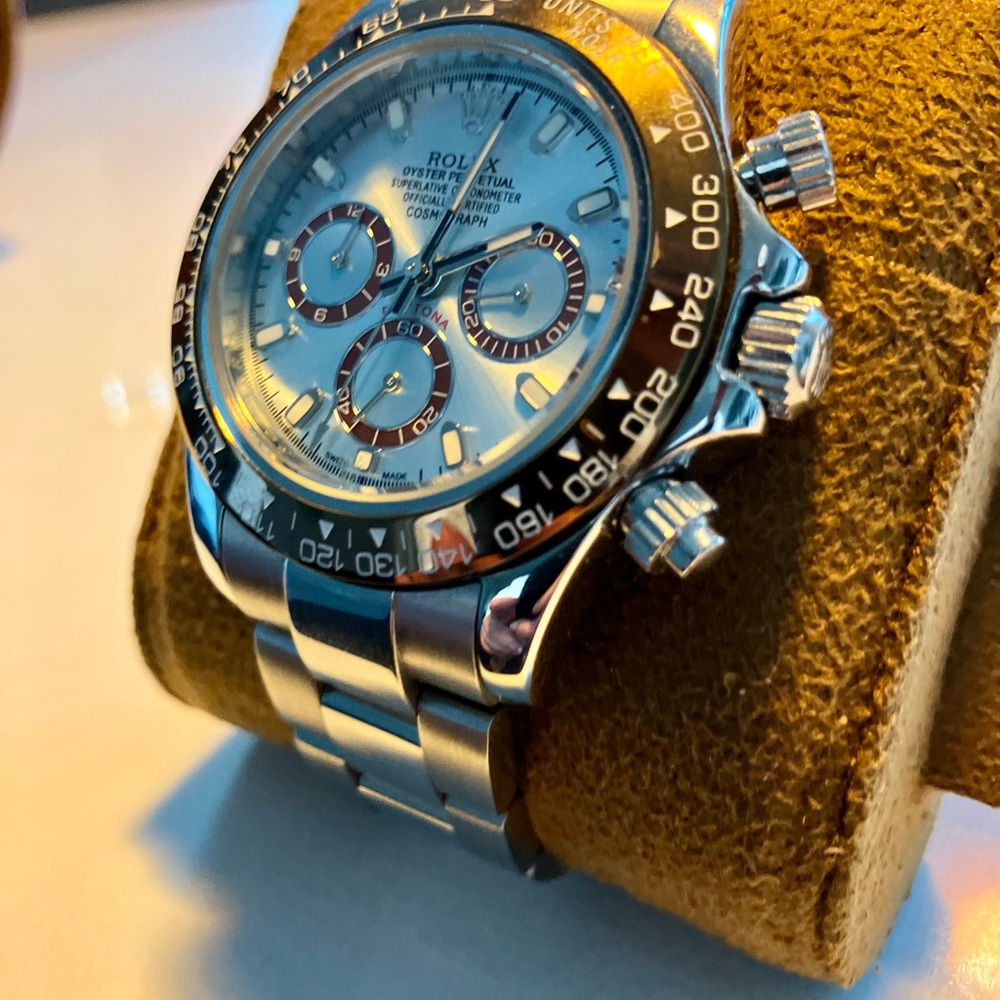 Silver and black Chronograph Daytona with platinum blue dial.